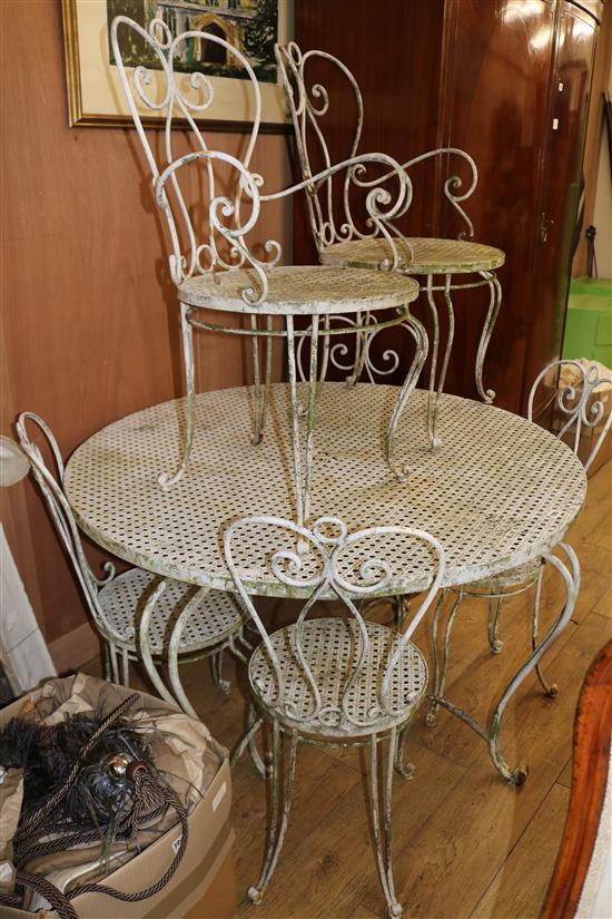 A garden table and six chairs W.120cm